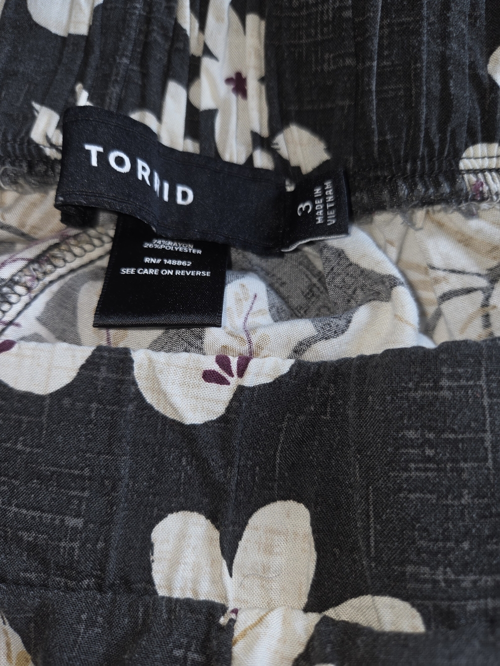 torrid Black Wide-Leg Floral Pants with Cream and Gold Blooms - Picture 4 of 4